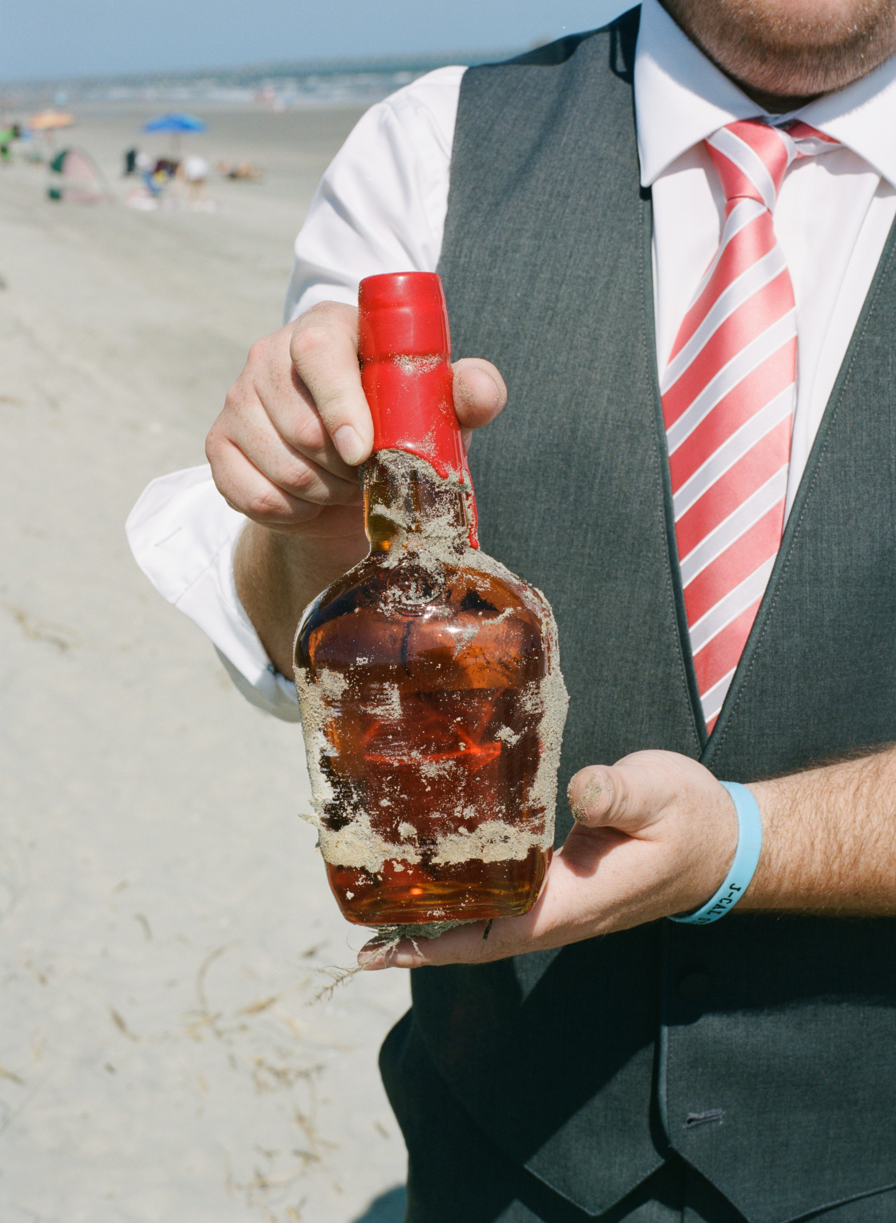 southern wedding traditions sandy bourbon bottle photo