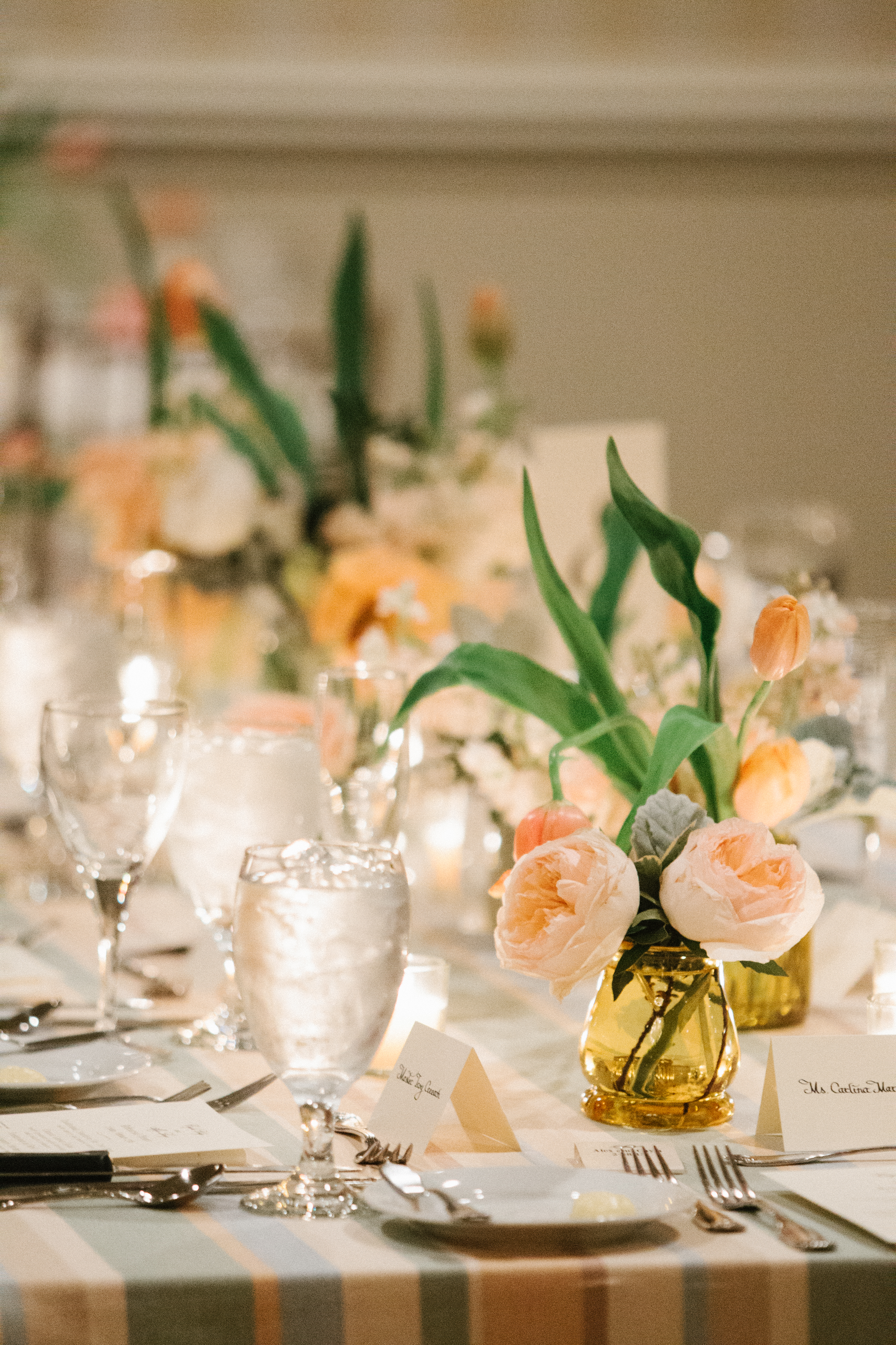 southern wedding traditions flowers on table with glasses photo