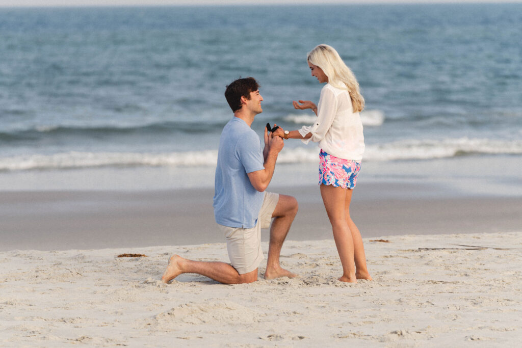 Surprise engagement proposal in pawleys Island by myrtle beach wedding photographer gillian claire