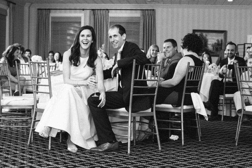 bride and groom at wedding reception by gillian claire