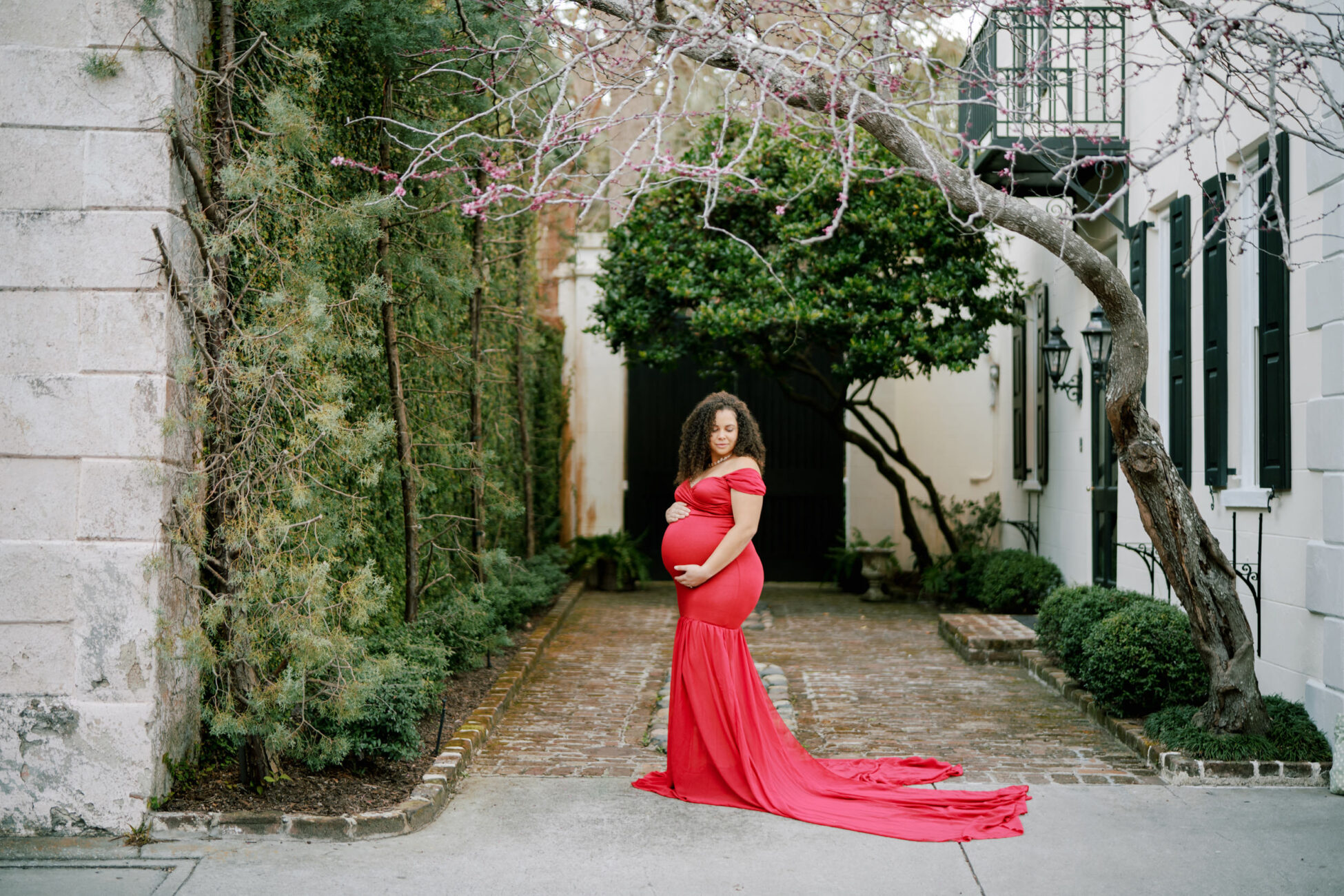 red dress Maternity session in Charleston by Charleston photographer Gillian Claire